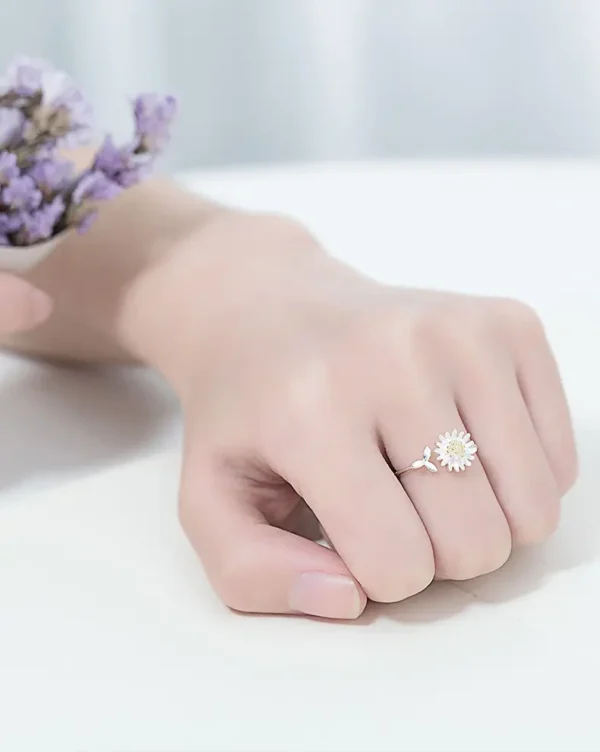 Adjustable silver daisy flower ring with gold center, perfect for women